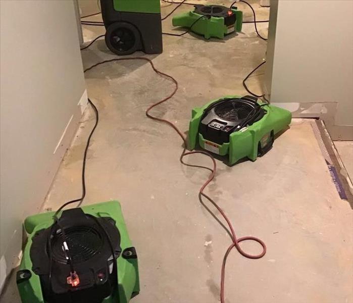 basement concrete floor with air movers