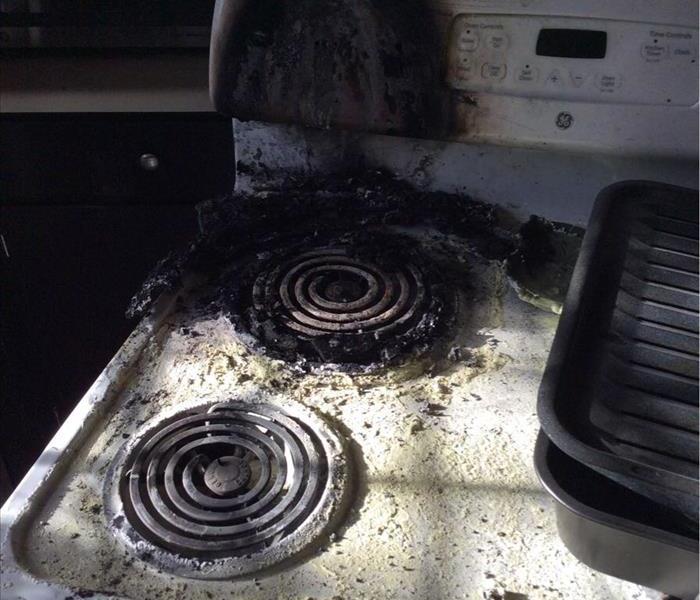 stove with coil fire damage