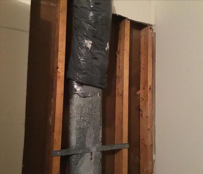 hvac pipe with drywall removed