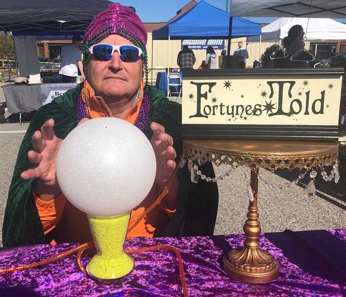 man dressed in fortune teller costume